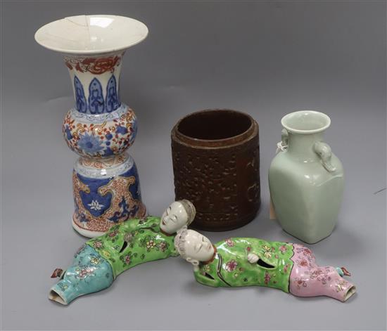 A Chinese celadon glazed vase, a carved wood brush pot, an Imari style vase, etc.